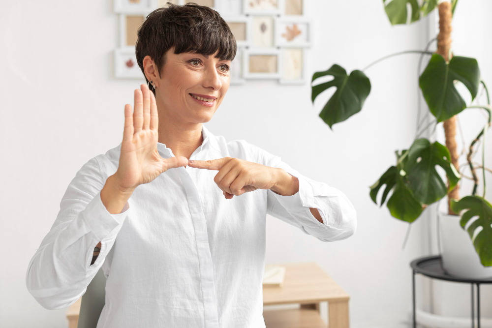 portrait-woman-teaching-sign-language.jpg