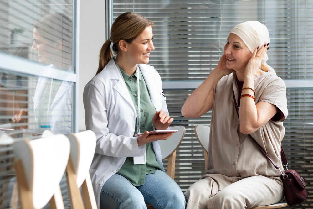 middle-aged-woman-with-skin-cancer-talking-with-her-doctor.jpg